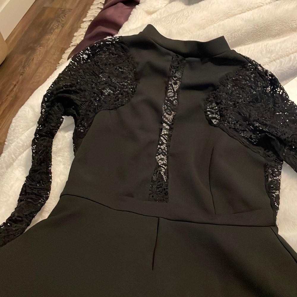 Black lace dress with shorts under skirt, size small